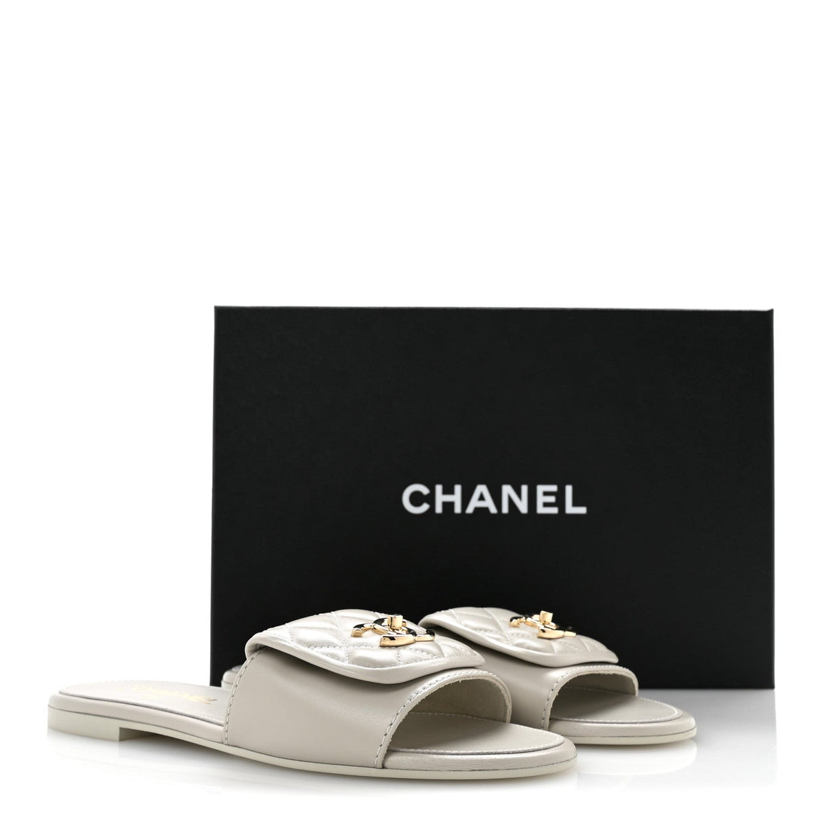Lambskin Quilted Turnlock Flat Mules 38.5 Light Gray