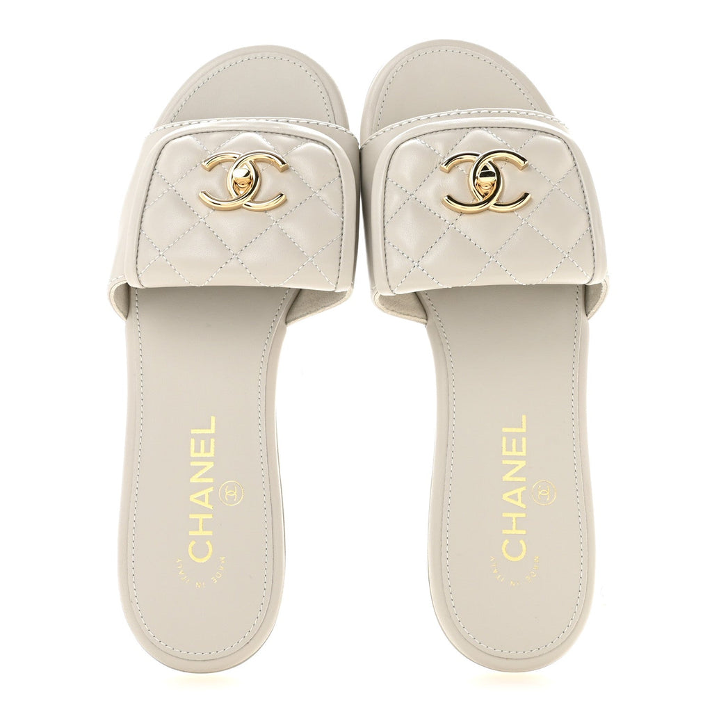 Lambskin Quilted Turnlock Flat Mules 38.5 Light Gray