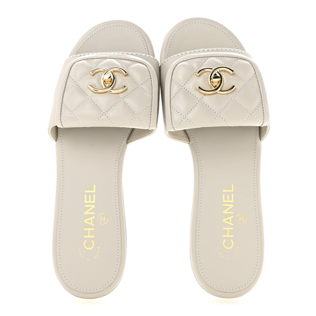 Lambskin Quilted Turnlock Flat Mules 38.5 Light Gray