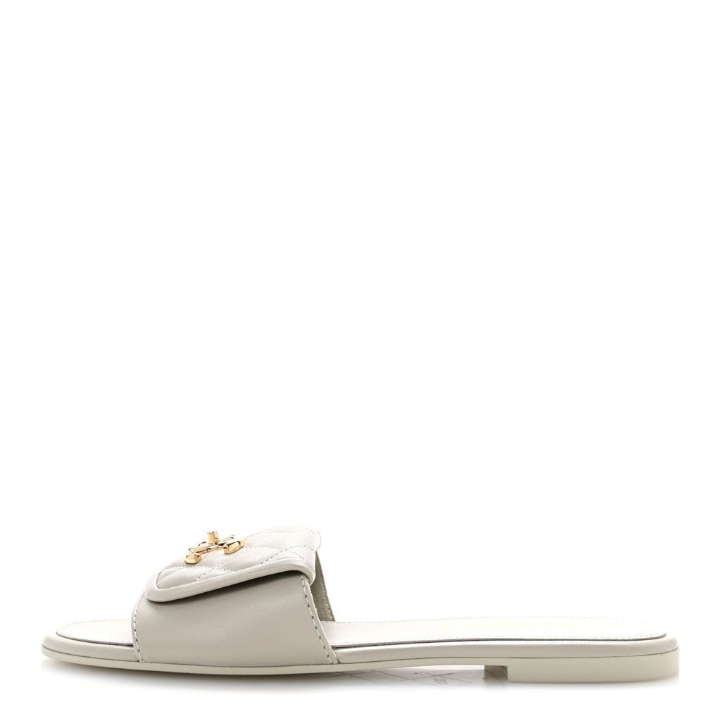 Lambskin Quilted Turnlock Flat Mules 38.5 Light Gray